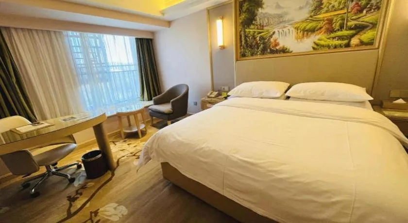 Bed in Vienna Hotel Yunnan Chunrong Street Qicai Yunan