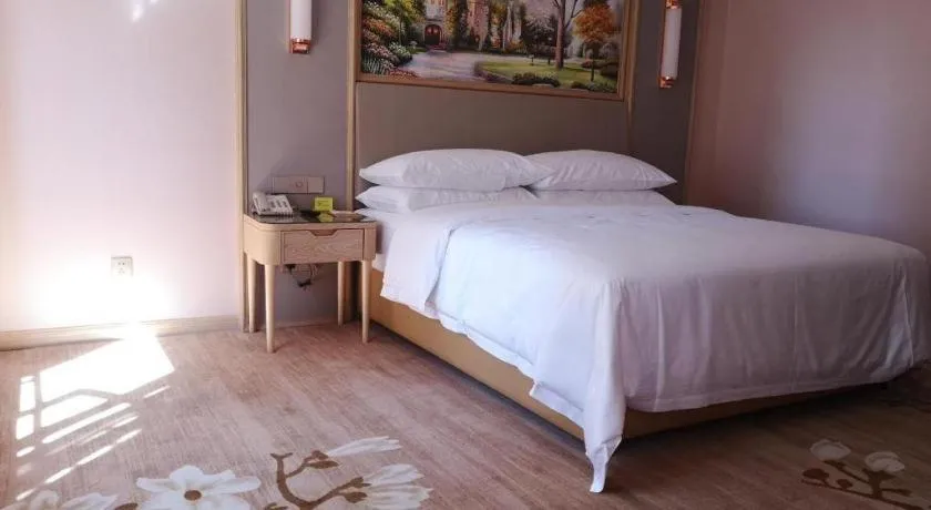 Bed in Vienna Hotel Yunnan Chunrong Street Qicai Yunan