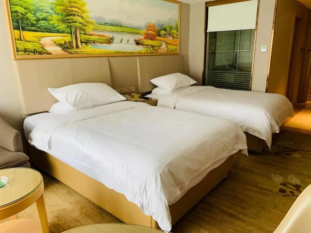 Bed in Vienna Hotel Yunnan Chunrong Street Qicai Yunan