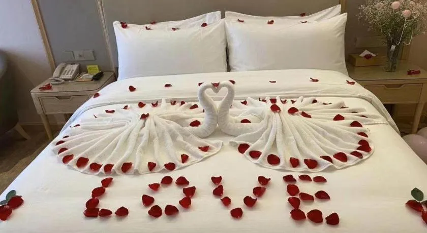 Bed in Vienna Hotel Yunnan Chunrong Street Qicai Yunan