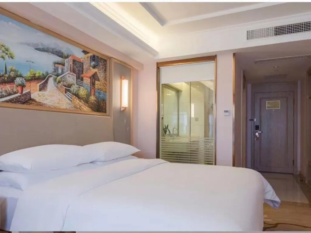 Bed in Vienna Hotel Yunnan Chunrong Street Qicai Yunan