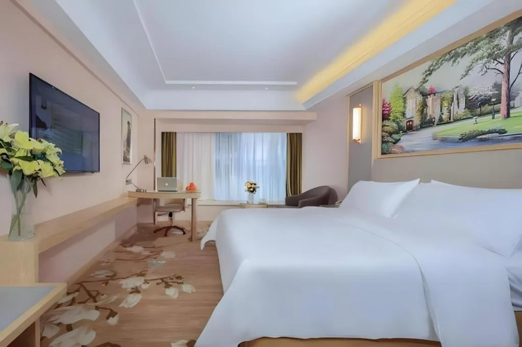 Bed in Vienna Hotel Yunnan Chunrong Street Qicai Yunan