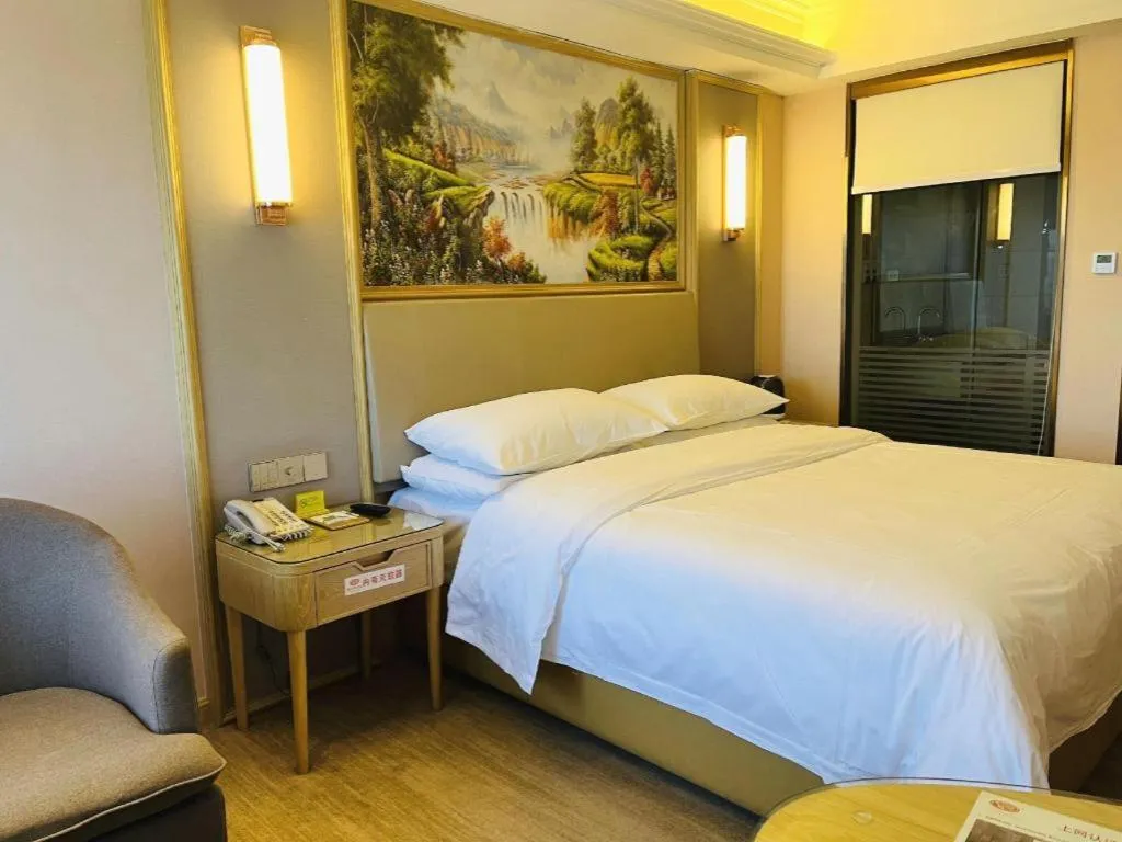 Bed in Vienna Hotel Yunnan Chunrong Street Qicai Yunan