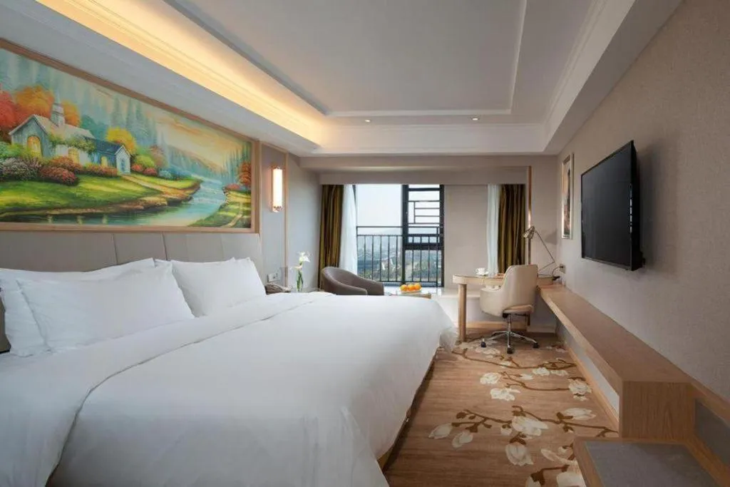 Bed in Vienna Hotel Yunnan Chunrong Street Qicai Yunan