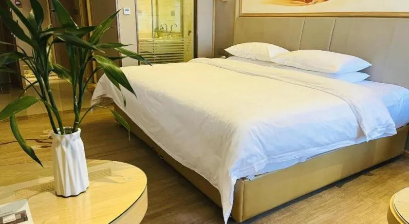 Bed in Vienna Hotel Yunnan Chunrong Street Qicai Yunan
