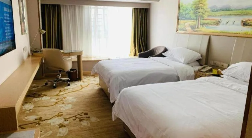 Bed in Vienna Hotel Yunnan Chunrong Street Qicai Yunan