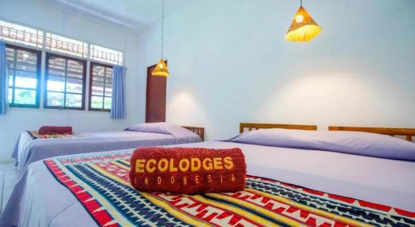 Bed in Satwa Elephant Eco Lodge