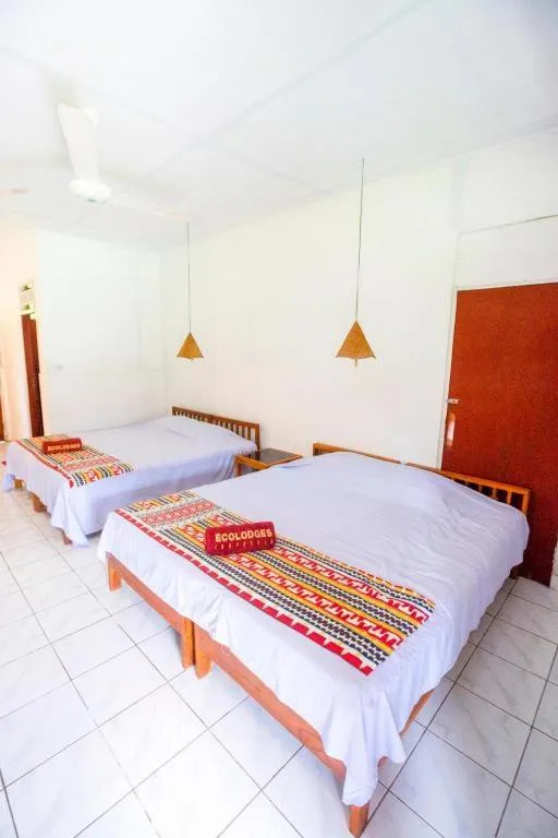 Bed in Satwa Elephant Eco Lodge