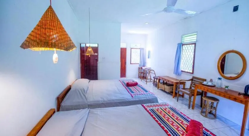 Bed in Satwa Elephant Eco Lodge