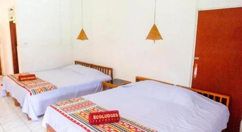 Bed in Satwa Elephant Eco Lodge