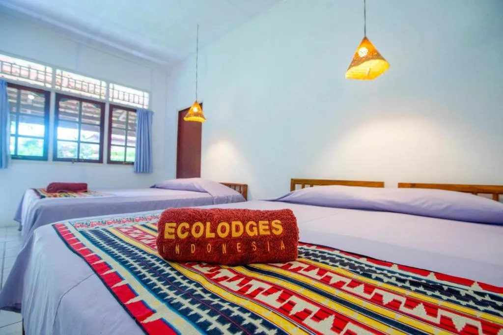 Bed in Satwa Elephant Eco Lodge