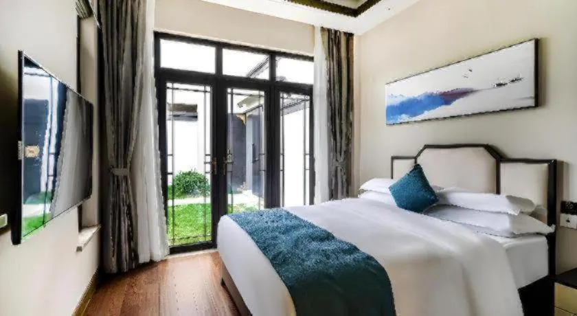 Bed in Poltton International Service Apartment Fujian Changtai Mayangxi