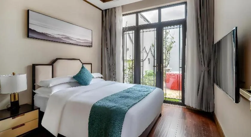 Bed in Poltton International Service Apartment Fujian Changtai Mayangxi