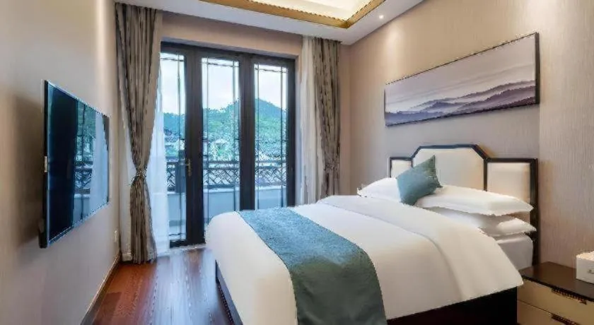 Bed in Poltton International Service Apartment Fujian Changtai Mayangxi