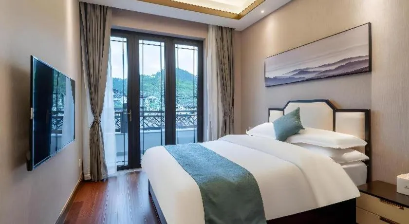 Bed in Poltton International Service Apartment Fujian Changtai Mayangxi