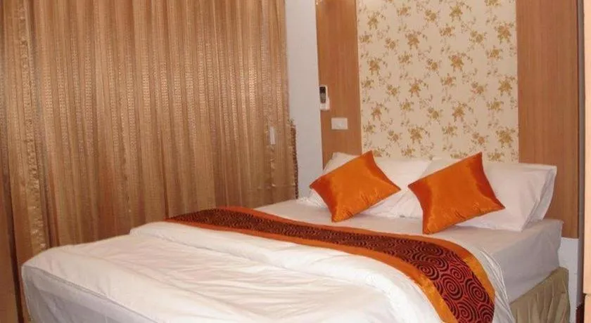 Bed in Diamond Sweet Hotel