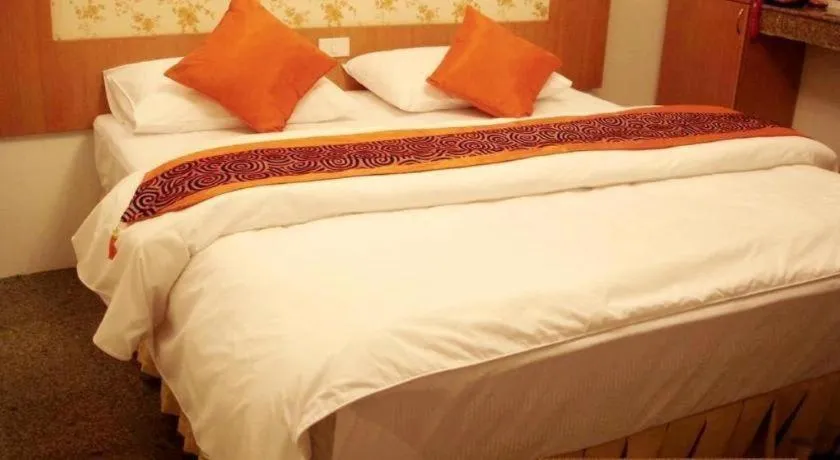 Bed in Diamond Sweet Hotel