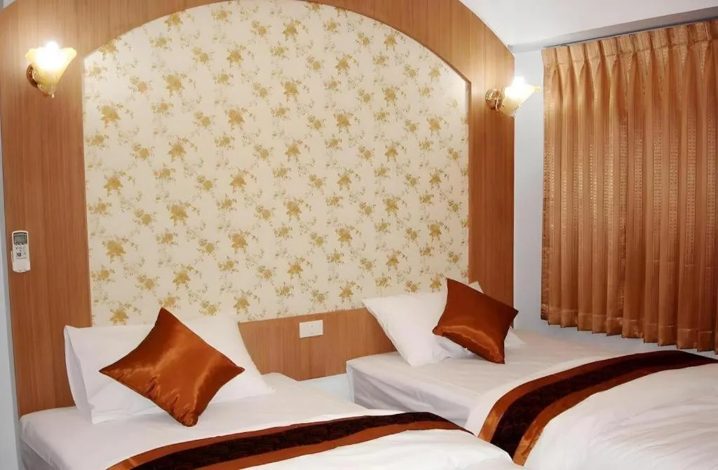 Bed in Diamond Sweet Hotel