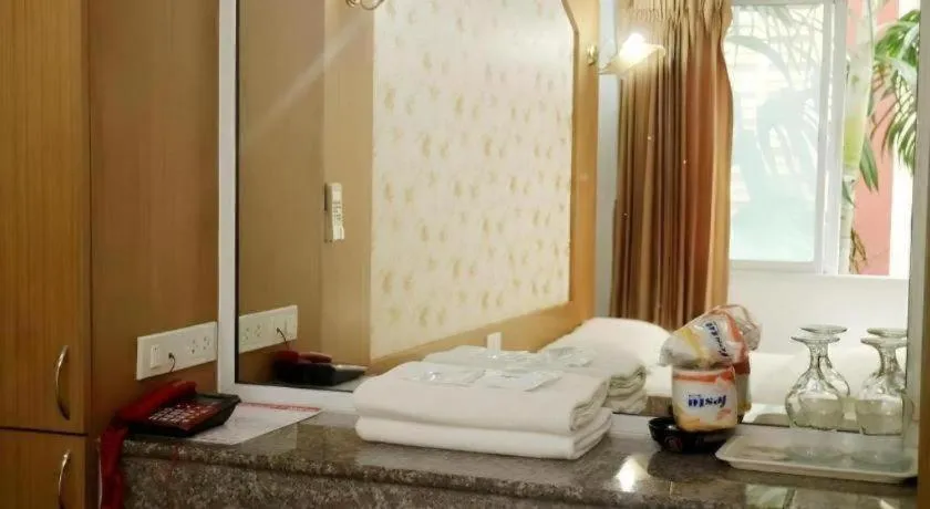 Bed in Diamond Sweet Hotel