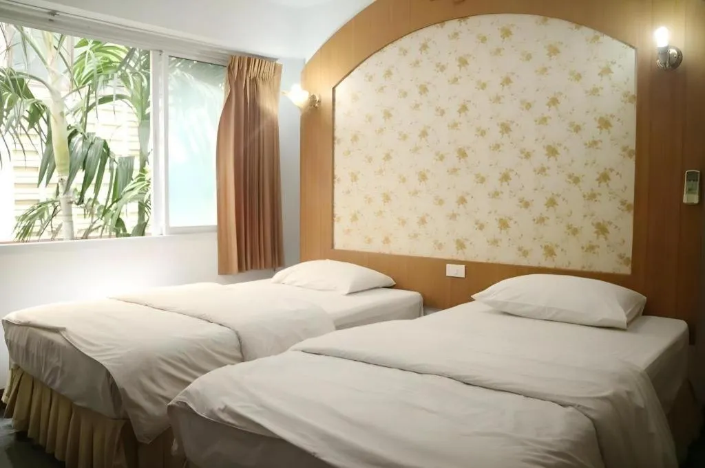 Bed in Diamond Sweet Hotel