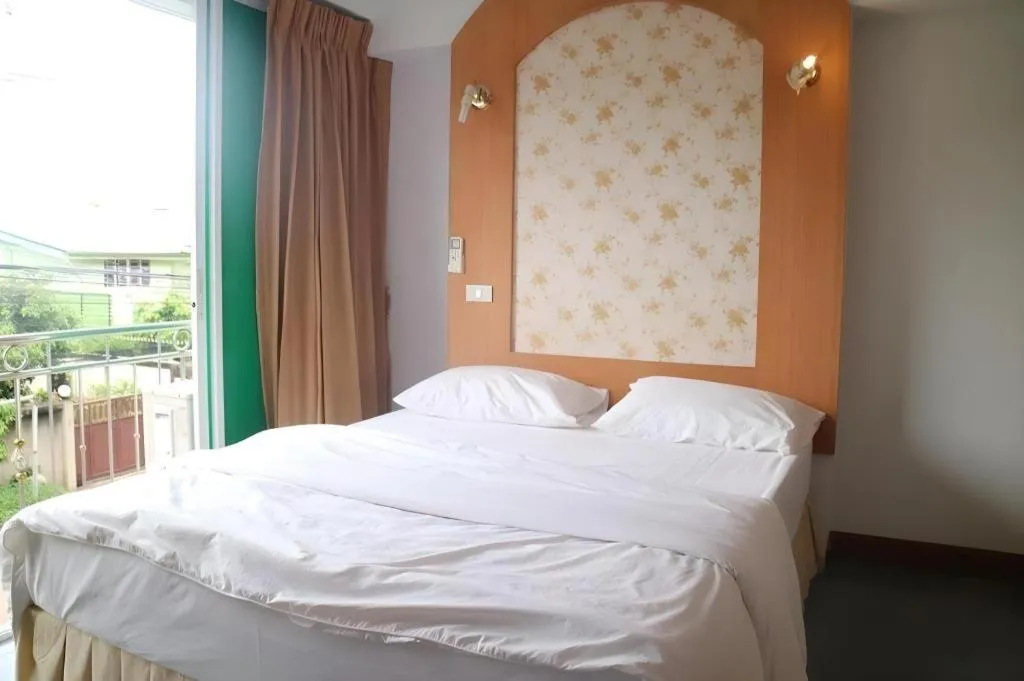 Bed in Diamond Sweet Hotel