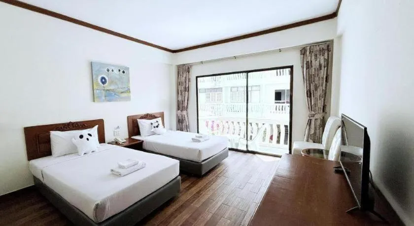 Bed in Paisiri Hotel