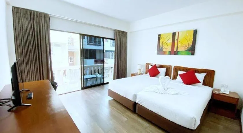 Bed in Paisiri Hotel