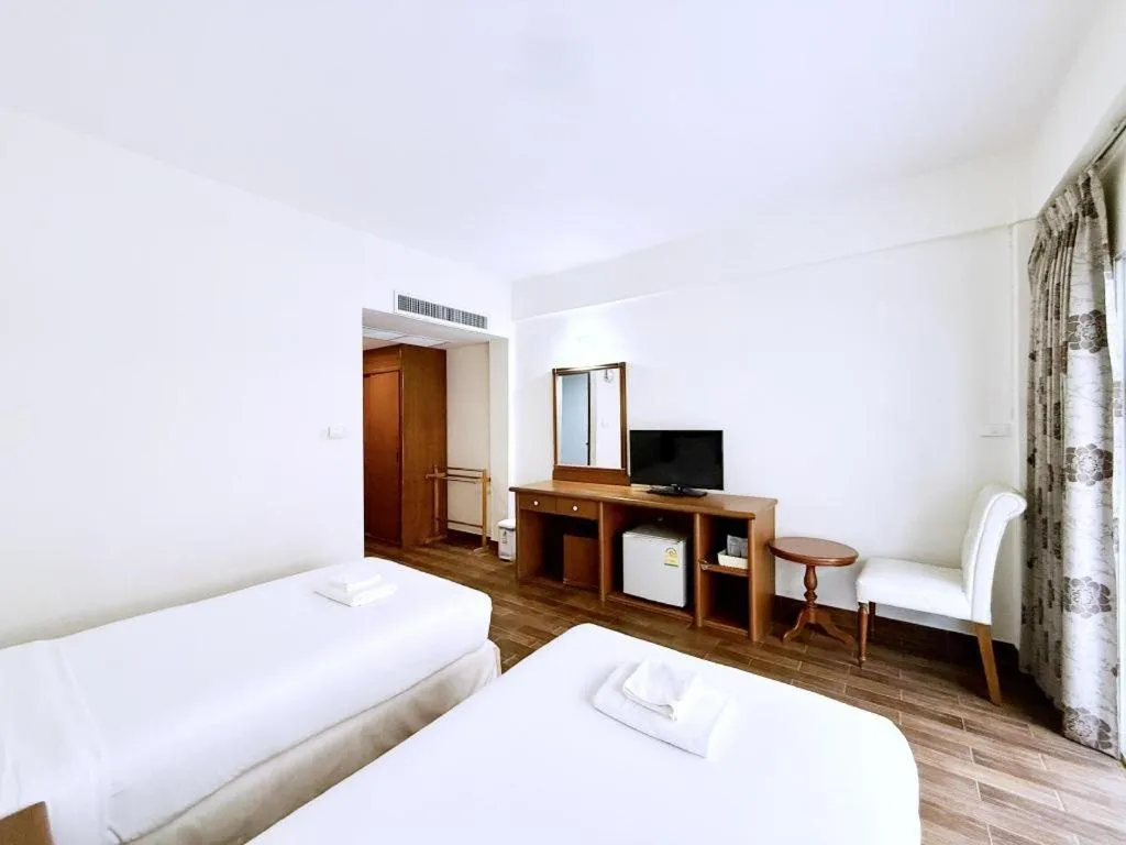 Bed in Paisiri Hotel