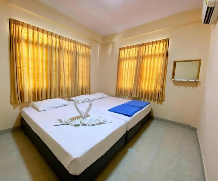 Bed in Paisiri Hotel