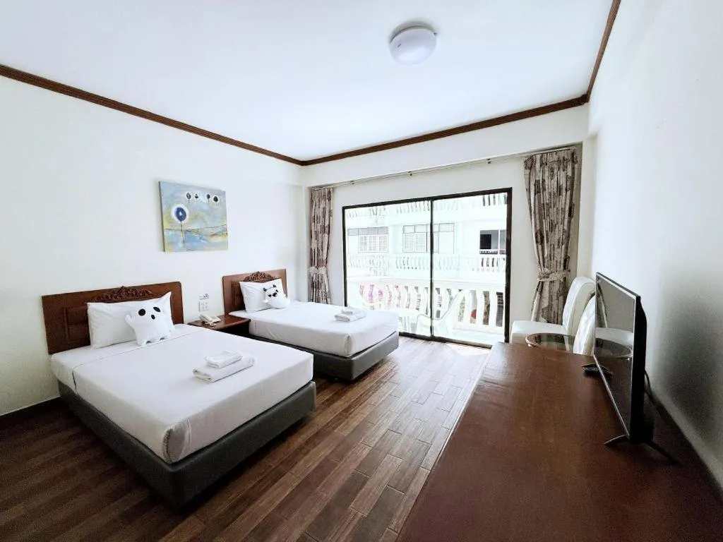 Bed in Paisiri Hotel