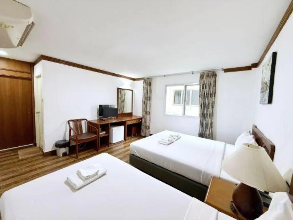 Bed in Paisiri Hotel