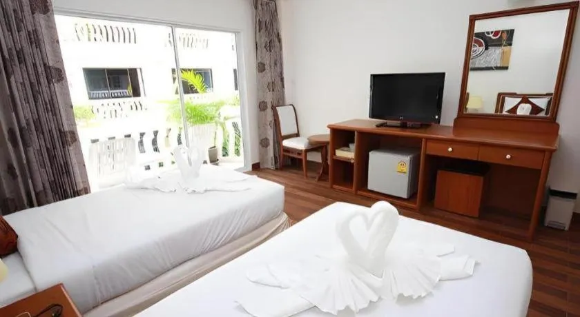 Bed in Paisiri Hotel