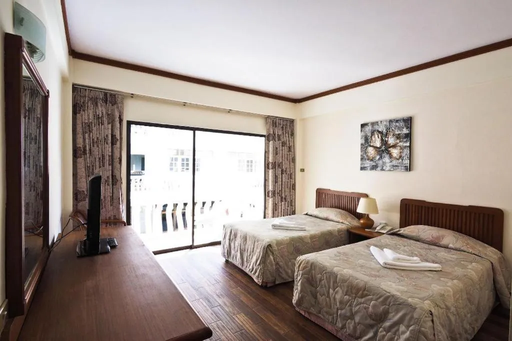 Bed in Paisiri Hotel