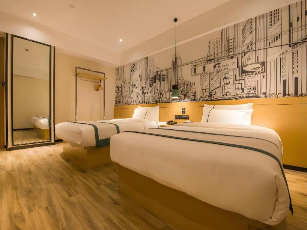 Bed in City Comfort Inn Guiping Xishan