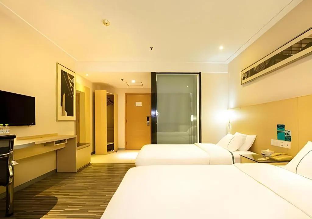 Bed in City Comfort Inn Guiping Xishan