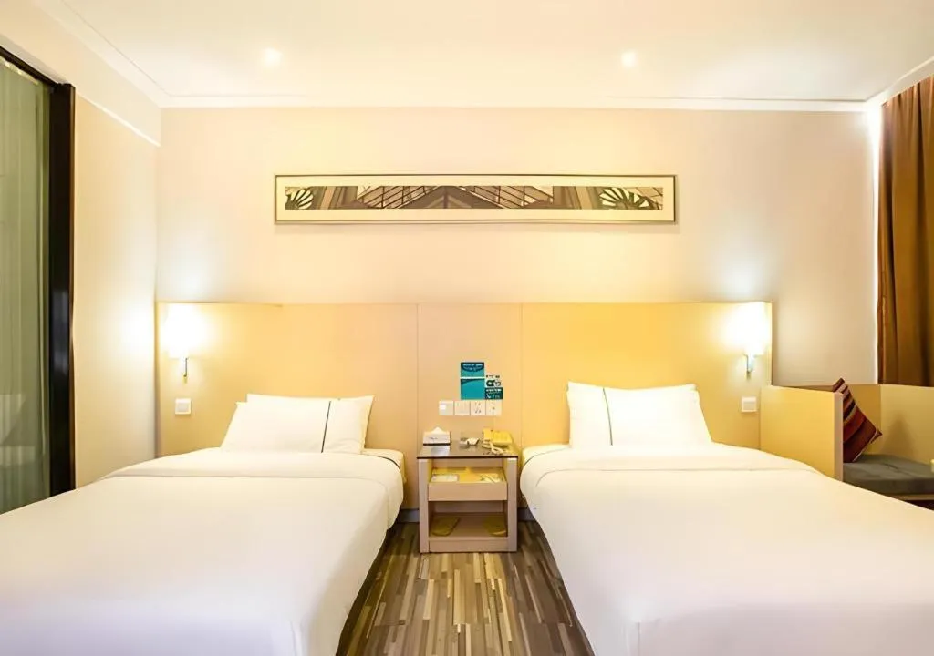 Bed in City Comfort Inn Guiping Xishan