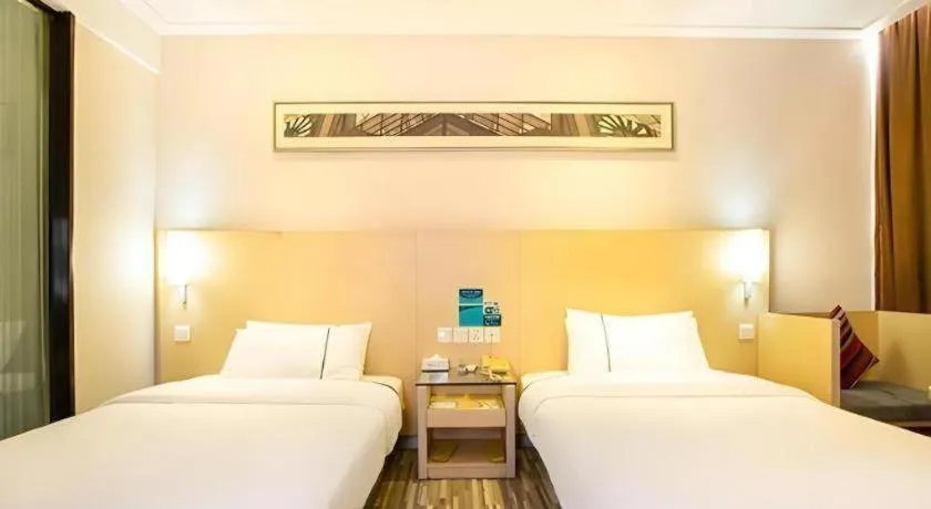 Bed in City Comfort Inn Guiping Xishan