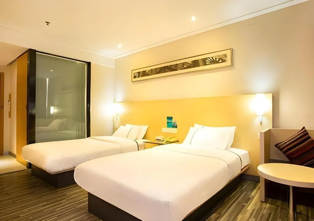 Bed in City Comfort Inn Guiping Xishan