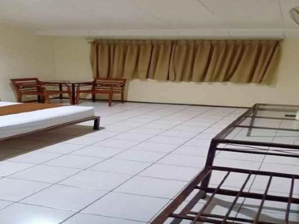 Bed in Hotel Augusta Jakarta