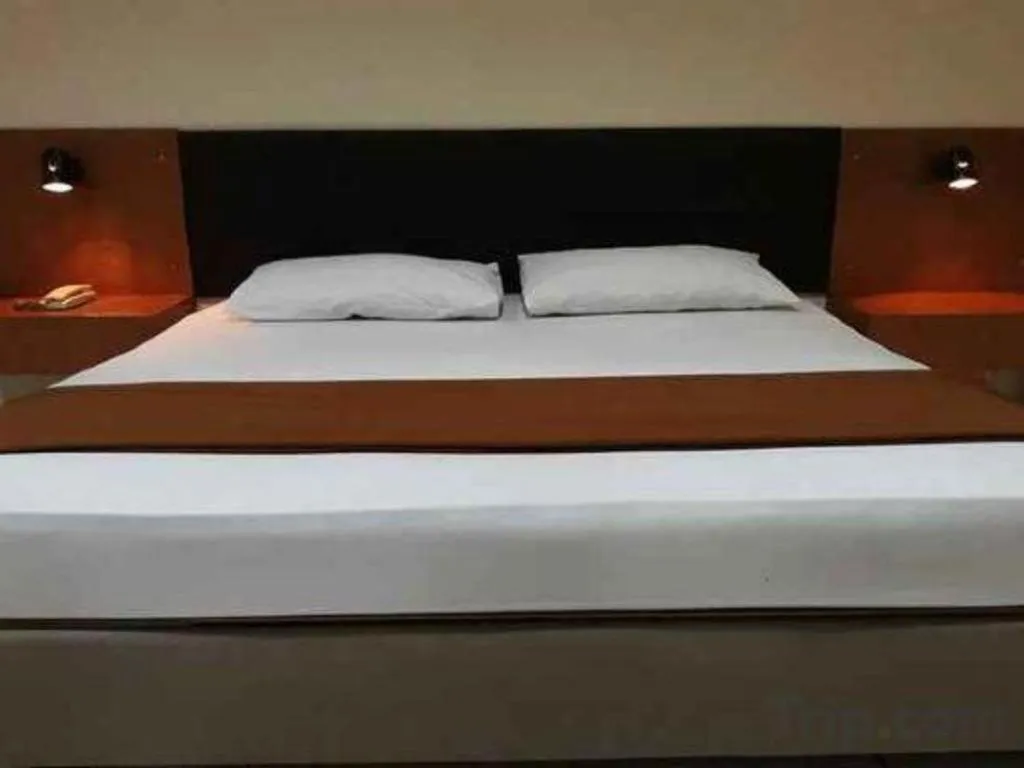 Bed in Hotel Augusta Jakarta