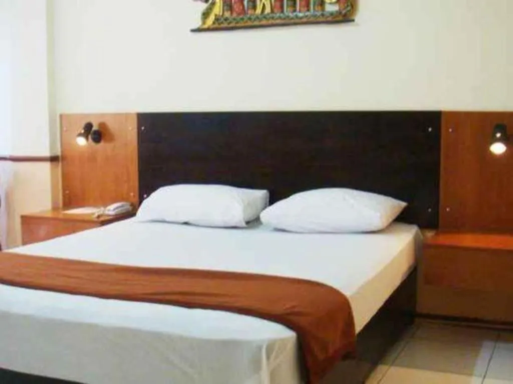 Bed in Hotel Augusta Jakarta