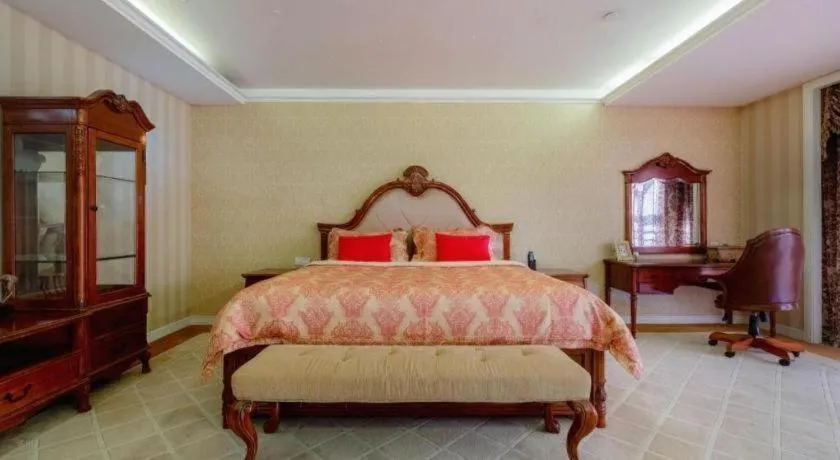 Bed in Country Garden Phoenix Hotel Chizhou Jiuhua Mountain