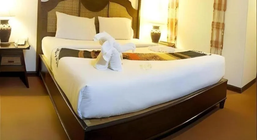 Bed in Phuphaya Resort Pattaya