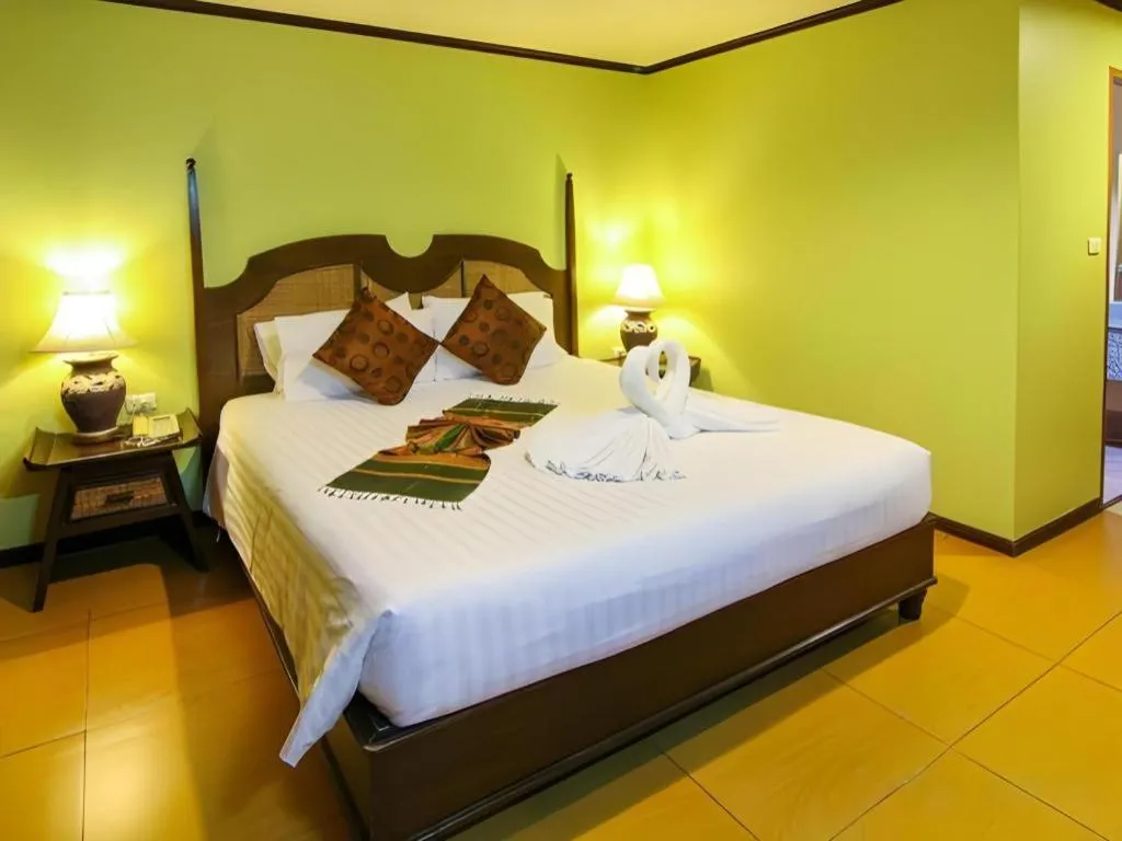 Bed in Phuphaya Resort Pattaya