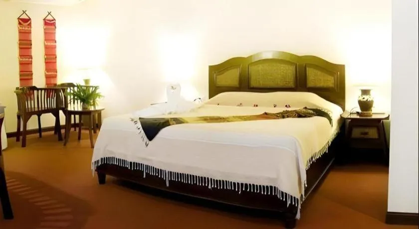 Bed in Phuphaya Resort Pattaya