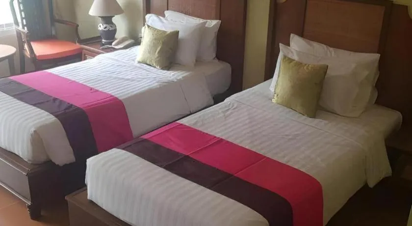 Bed in Phuphaya Resort Pattaya