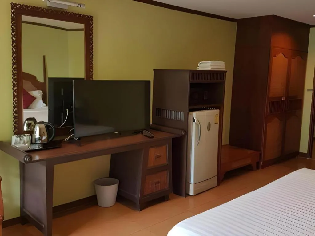 Bed in Phuphaya Resort Pattaya