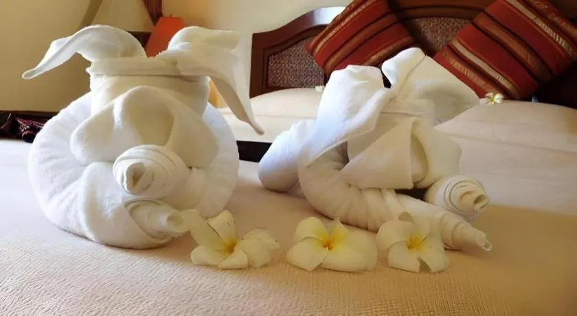 Bed in Phuphaya Resort Pattaya