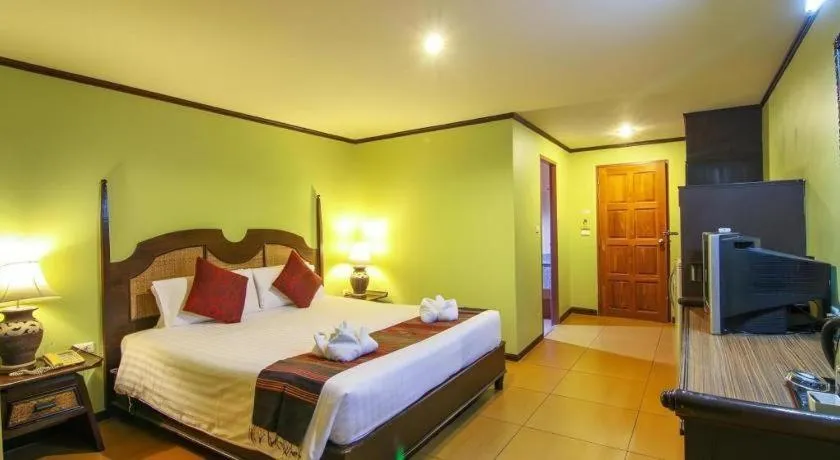 Bed in Phuphaya Resort Pattaya