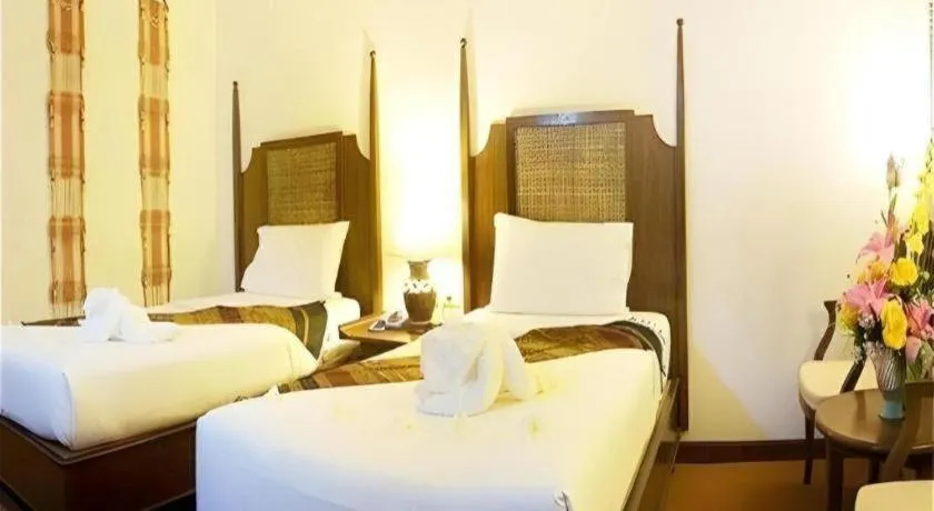 Bed in Phuphaya Resort Pattaya